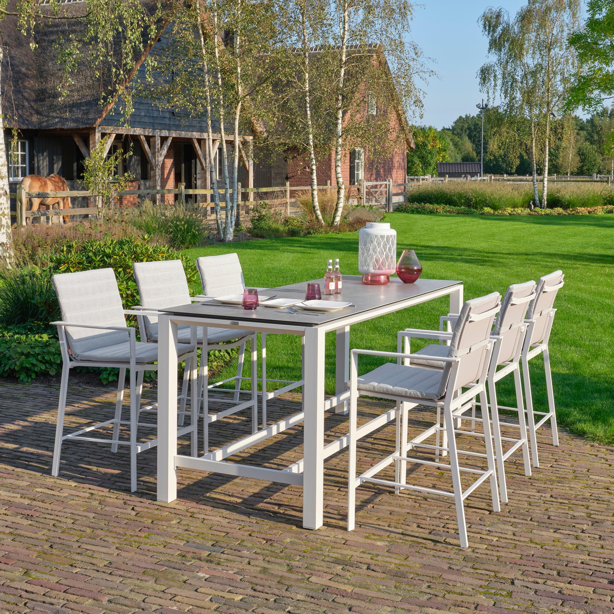 Primavera 7-Piece Bar Set - White  in a beautiful outdoor patio setting