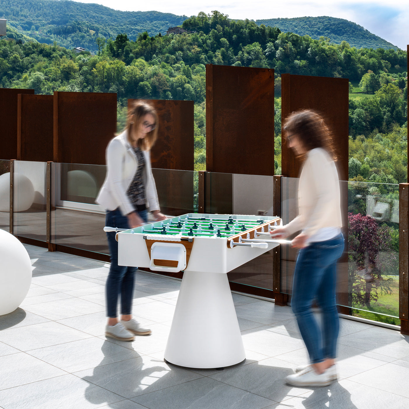 Ciclope White Foosball Table lifestyle image with players