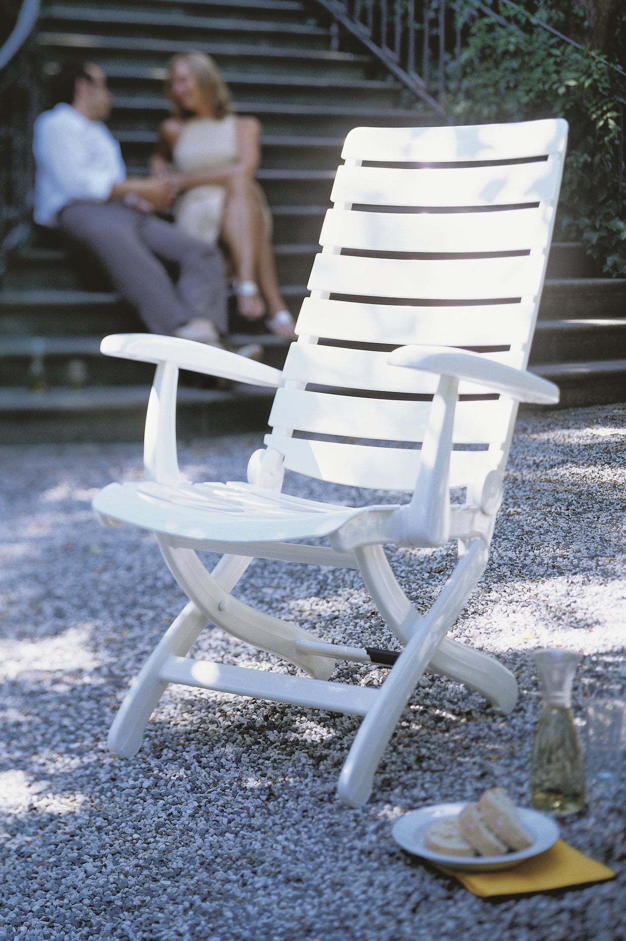 Tiffany resin chair in gravel lifestyle